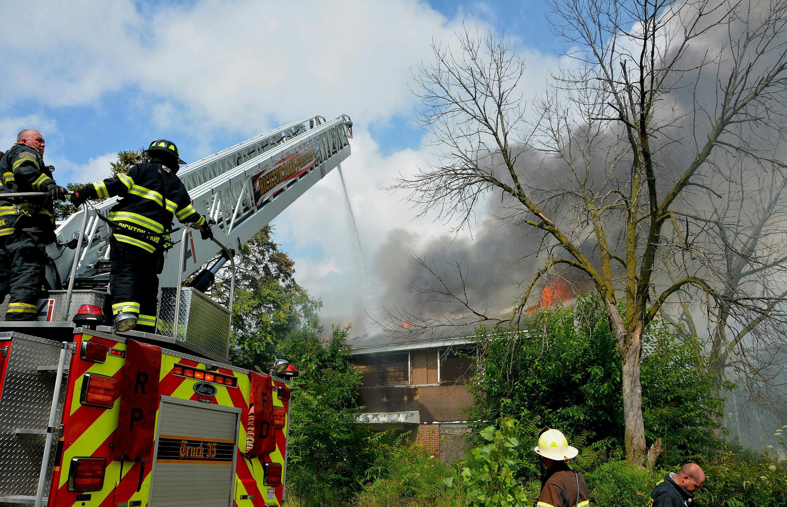 firefighters putting out house fire