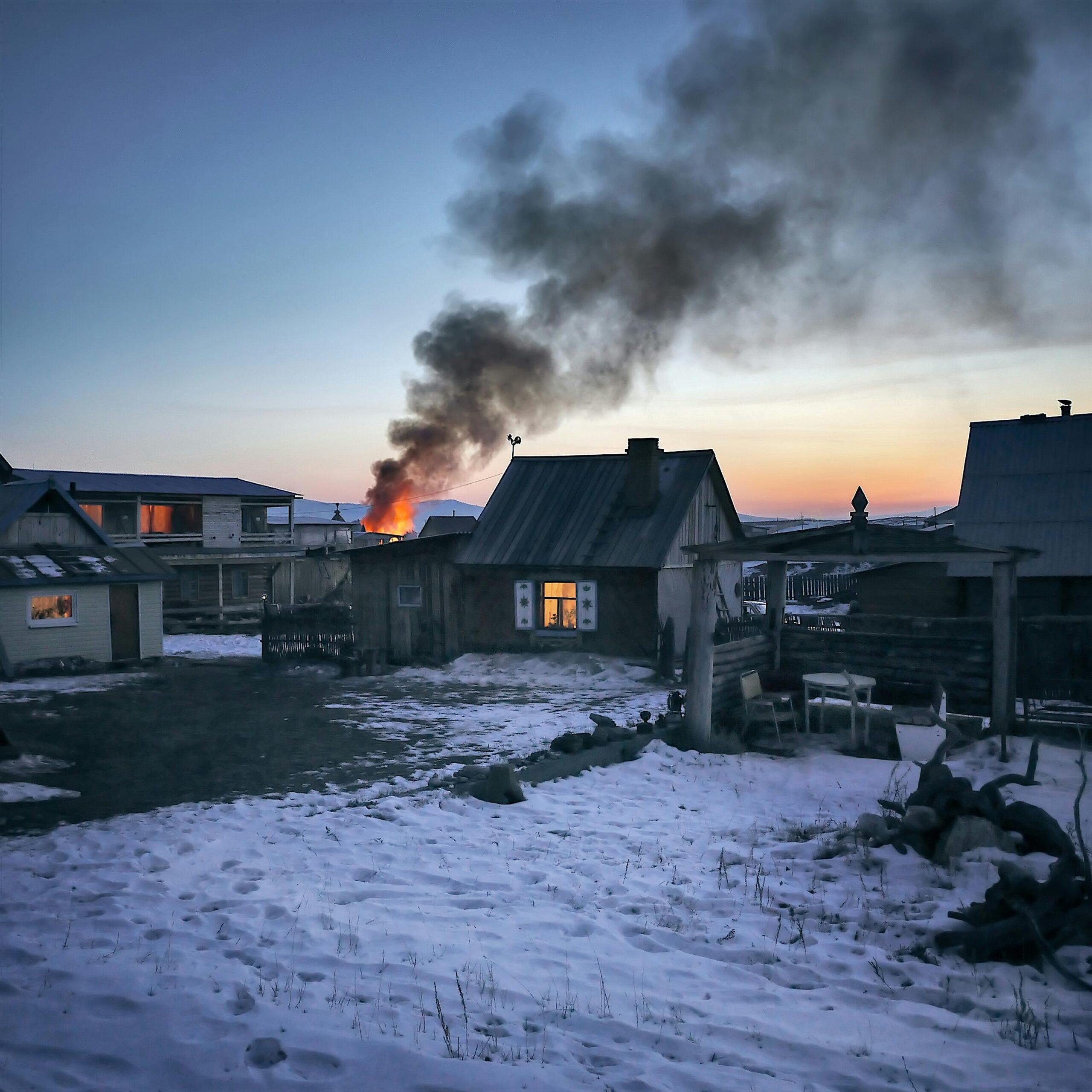 house on fire in winter